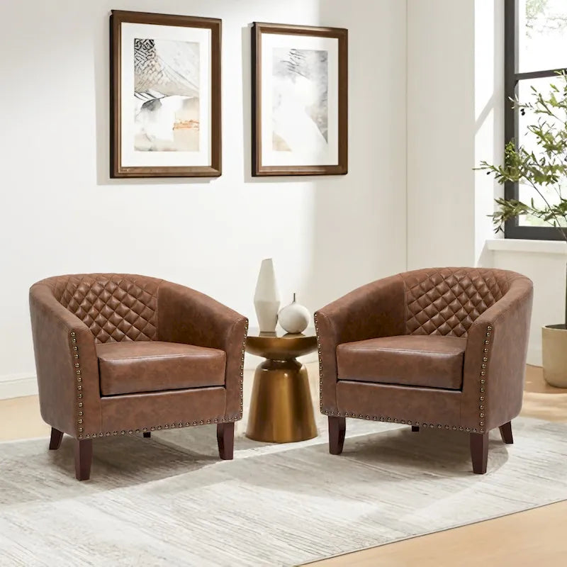 2 Poltrone a barile in pelle vegana con borchie